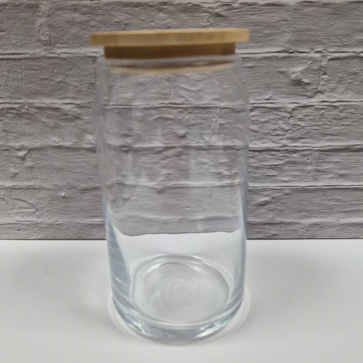 clear glass can with bamboo lid