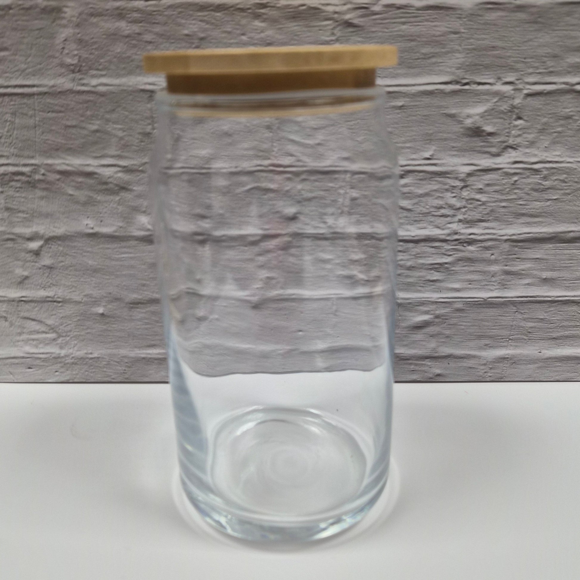 clear glass can with bamboo lid