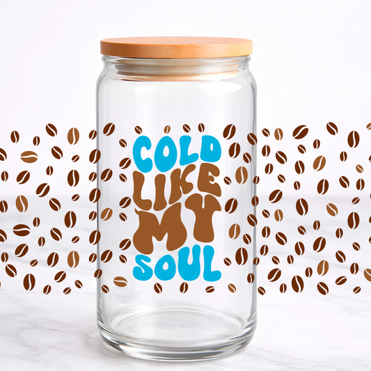 Clear glass jar with wooden lid and coffee bean pattern, featuring text 'Cold Like My Soul' on a white background.