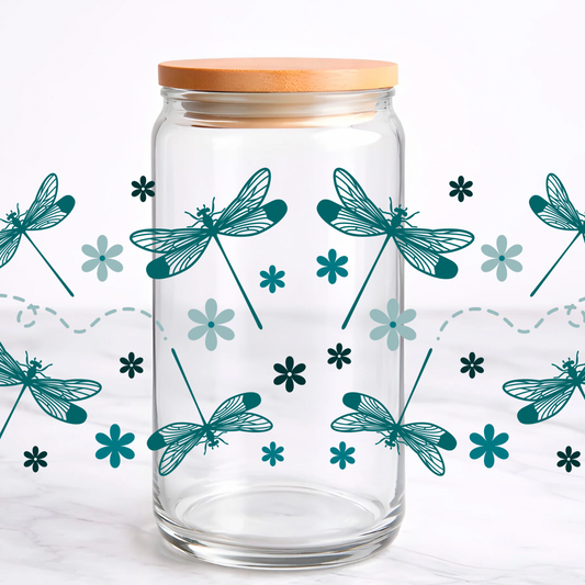 Clear glass jar with wooden lid and dragonfly design 